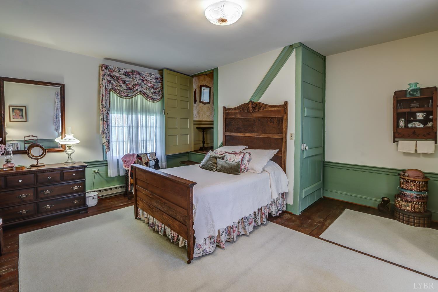 129 Lawyers Road Red House, VA 23963 - Photo 50 of 72 a bedroom with a bed and a window