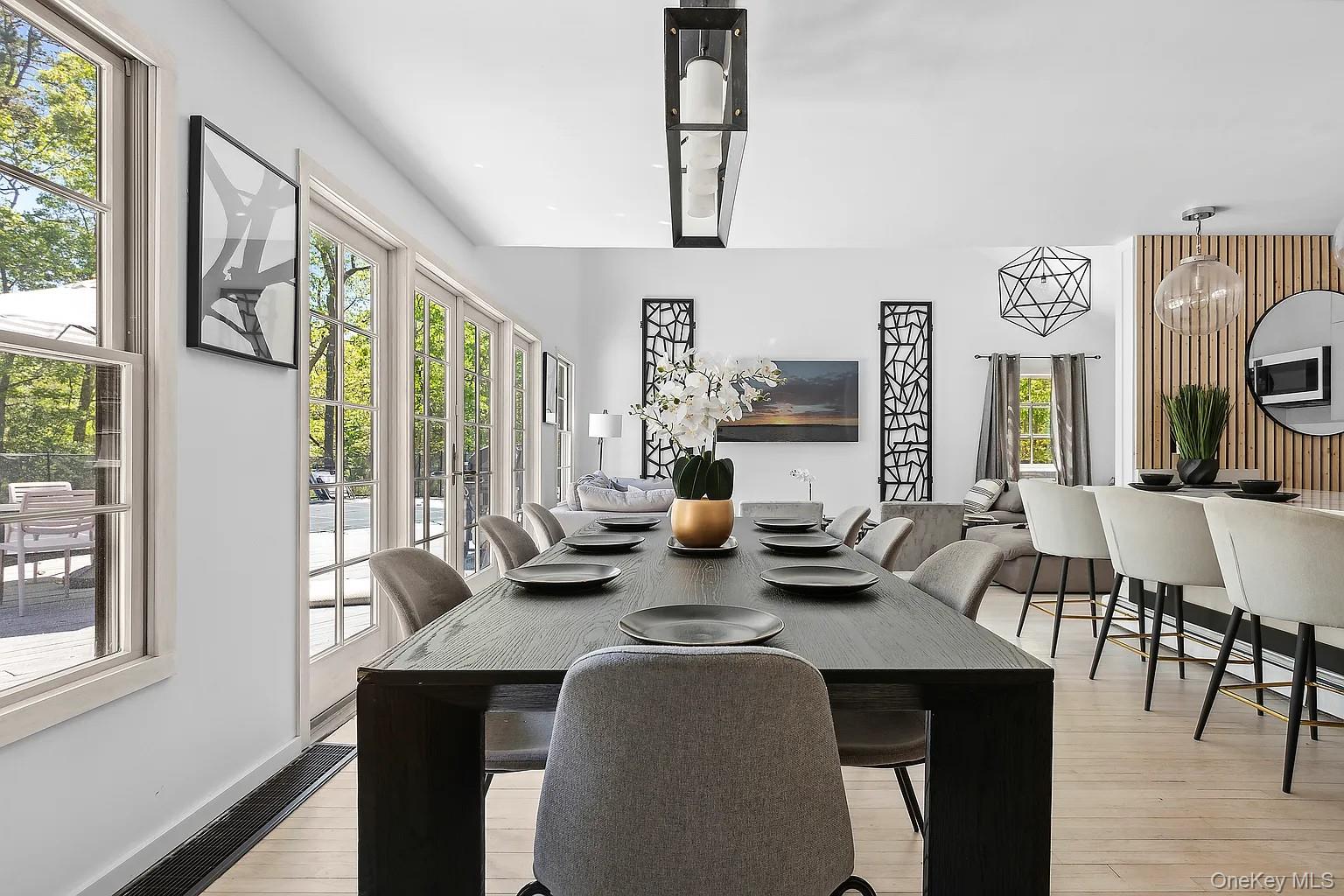12 North Quarter Road Westhampton, NY 11977 - Photo 11 of 23 a view of a dining room with furniture window and outside view