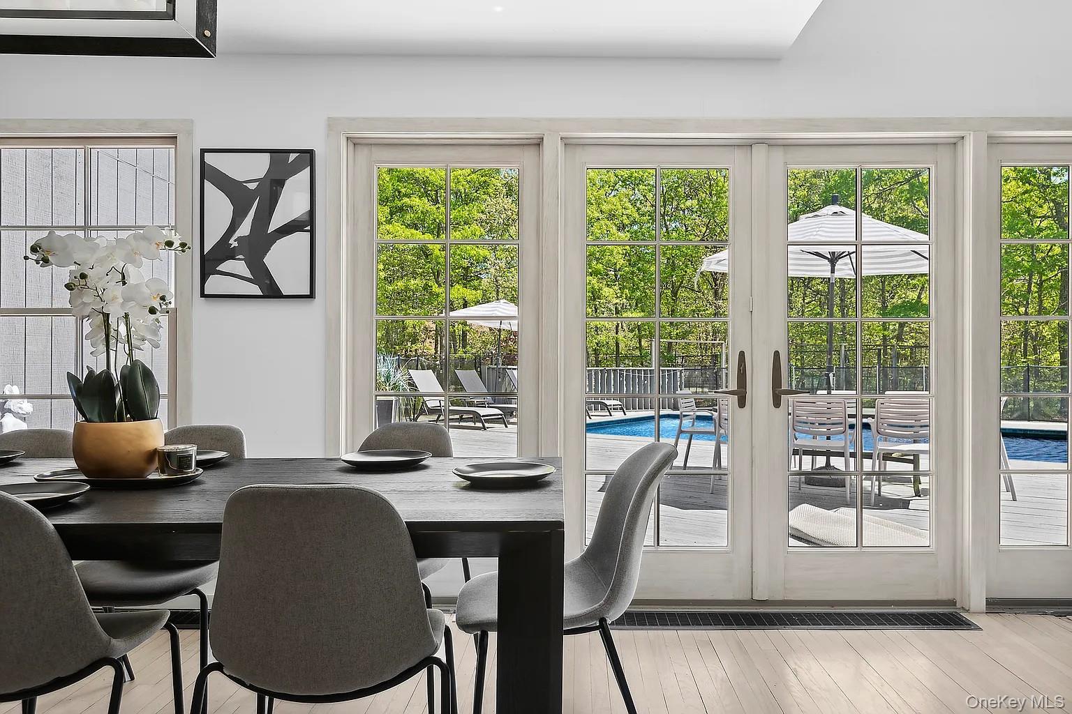 12 North Quarter Road Westhampton, NY 11977 - Photo 12 of 23 a dining room with furniture and window