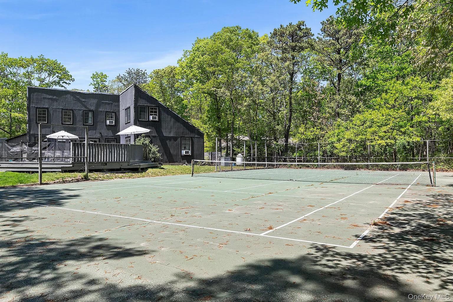 12 North Quarter Road Westhampton, NY 11977 - Photo 2 of 23 a view of a basketball court