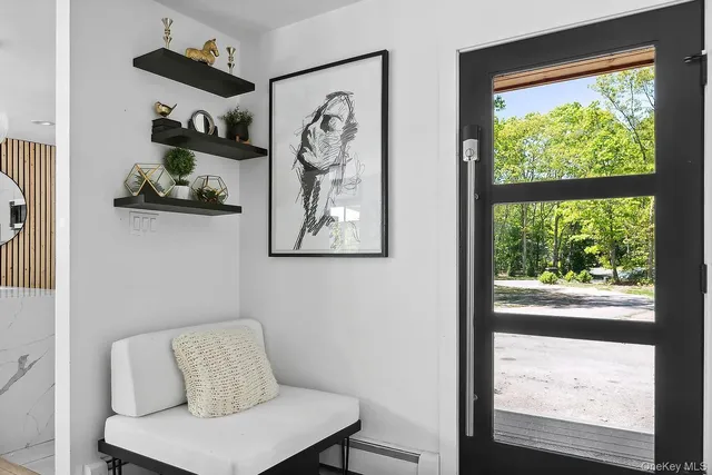 a view of entryway with a front door