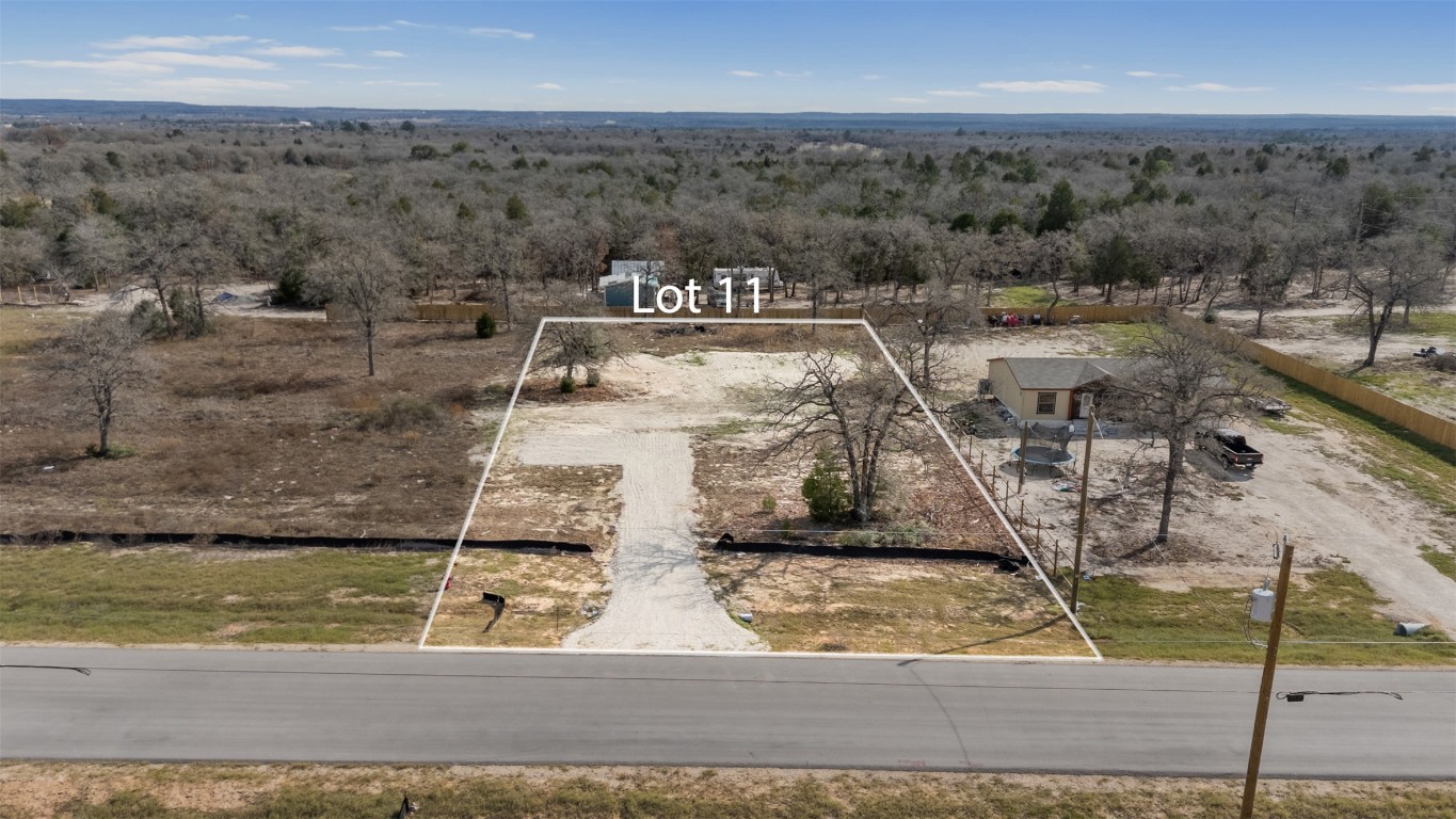 328 La Selva Drive Elgin, TX 78621 - Photo 2 of 10 View of rural area featuring property boundaries highlighted