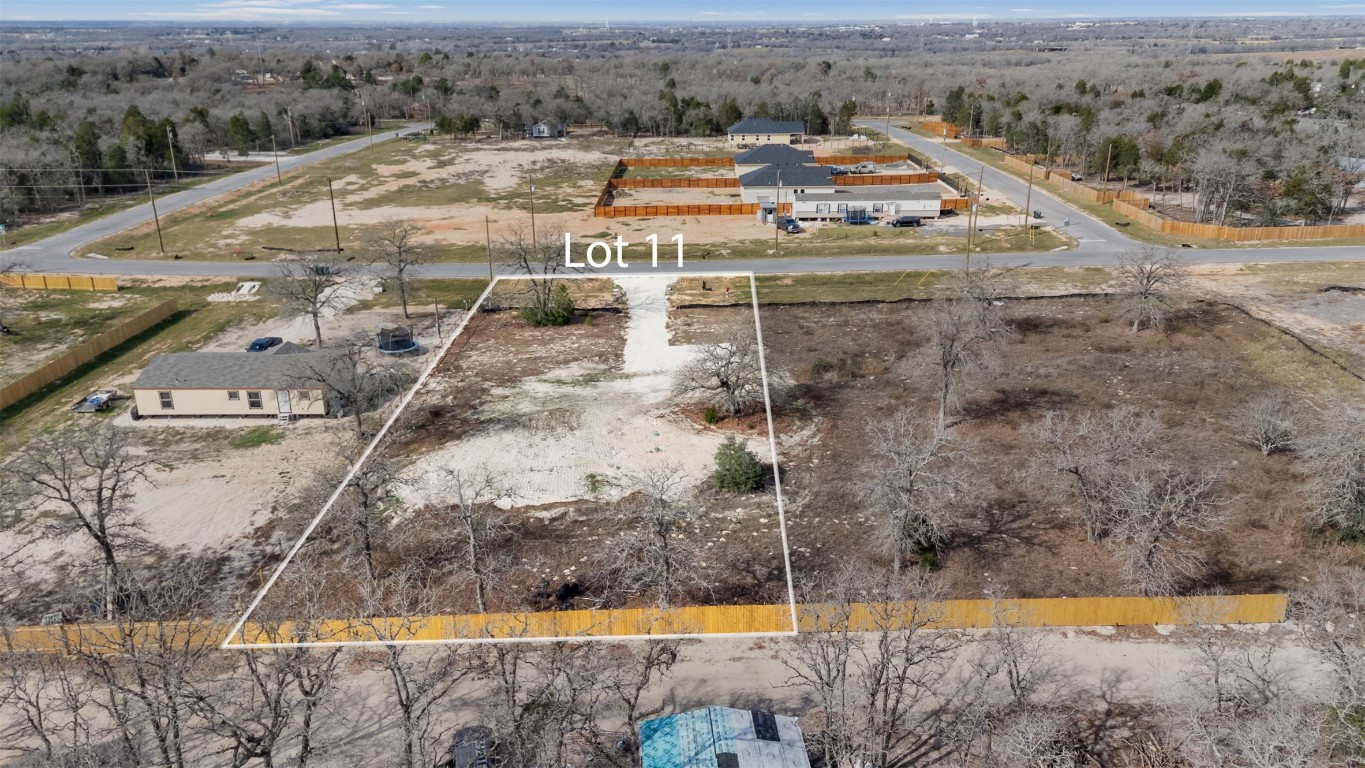 328 La Selva Drive Elgin, TX 78621 - Photo 4 of 10 Aerial overview of property's location featuring property boundaries highlighted
