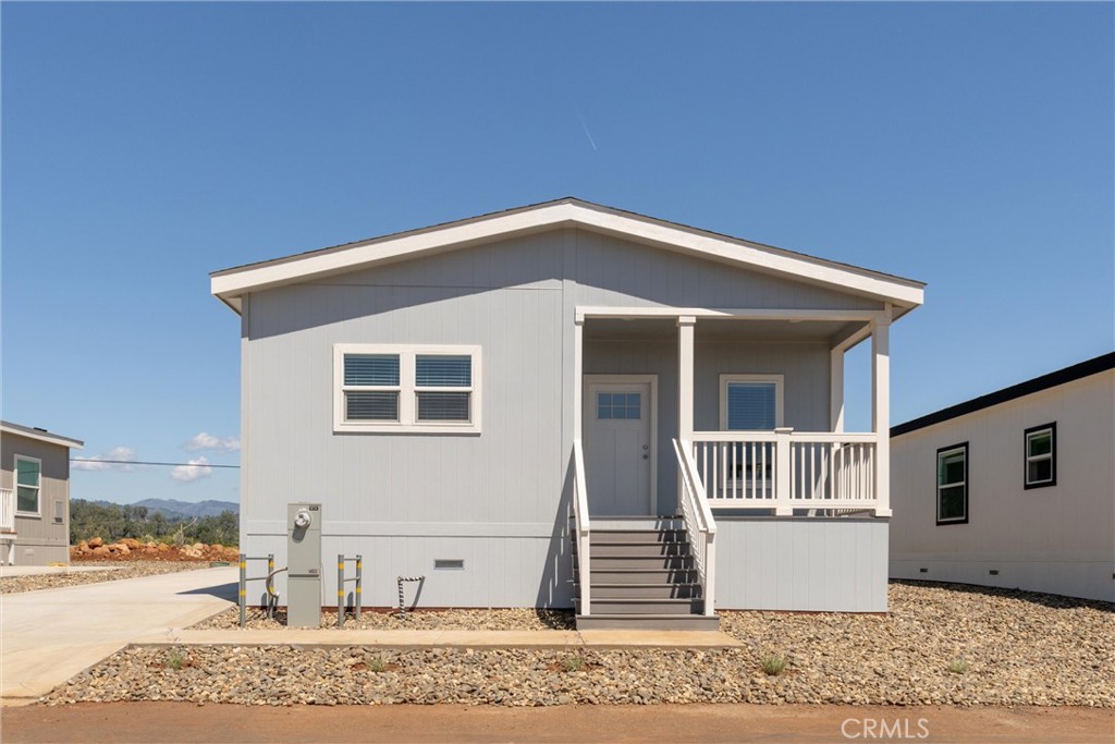 4333 Pentz Road, Unit 30 Paradise, CA 95969 - Photo 3 of 29 a front view of a house with garden