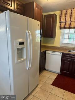 25 Country Club Road Willingboro, NJ 08046 - Photo 11 of 13 a kitchen with stainless steel appliances a refrigerator and a sink