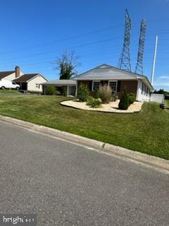 25 Country Club Road Willingboro, NJ 08046 - Photo 6 of 13 a front view of a house with a yard