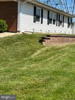25 Country Club Road Willingboro, NJ 08046 - Photo 7 of 13 a front view of a house with swimming pool