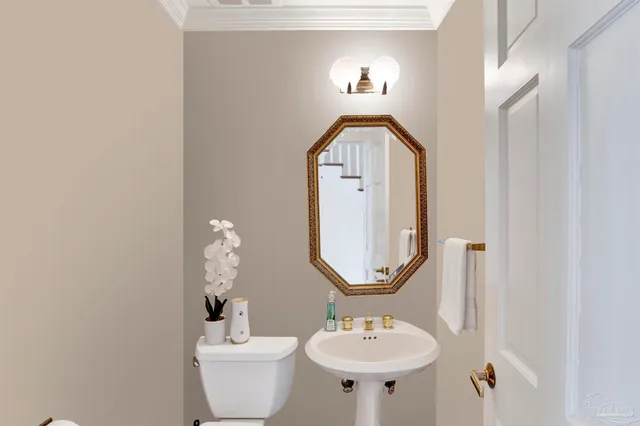 a bathroom with a double vanity sink mirror and