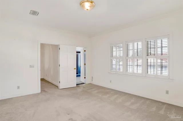 a bathroom with a double vanity sink a mirror and a shower