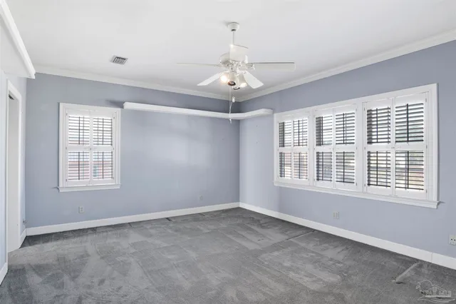 a view of bathroom with a shower and a toilet
