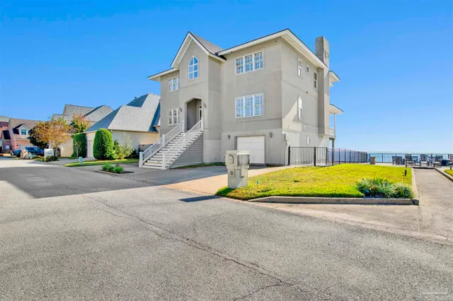 a view of a lake with a yard