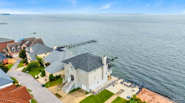 a view of a house with yard porch and sitting area