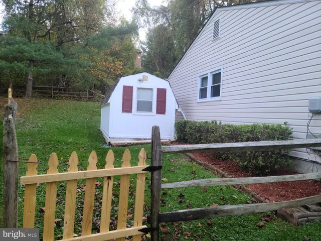 a view of backyard from a balcony