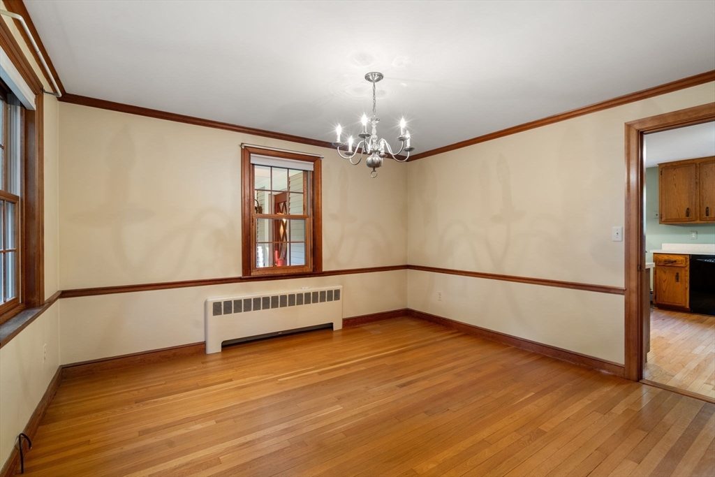 12 Glover Road Wayland, MA 01778 - Photo 13 of 27 a view of an empty room with wooden floor