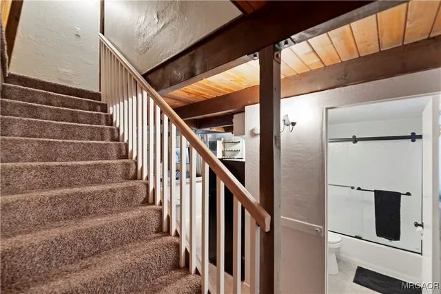 a room with a bed and a window