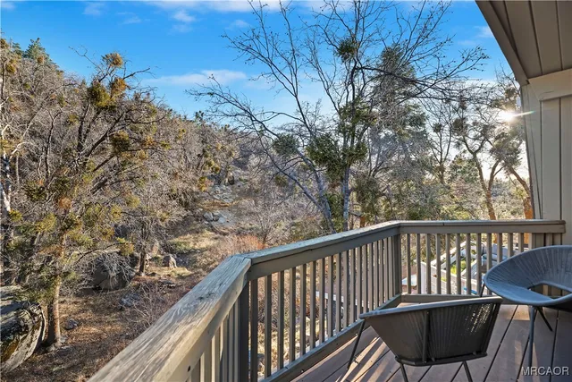 a backyard of a house with barbeque oven