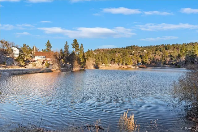 a view of a door and chair in the patio