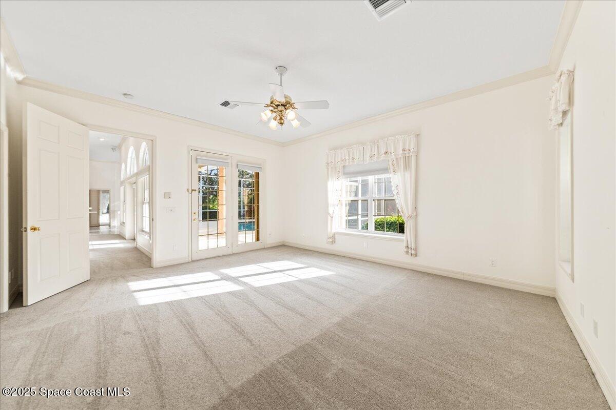 4245 Windover Way Melbourne, FL 32934 - Photo 13 of 50 a view of an empty room with a window
