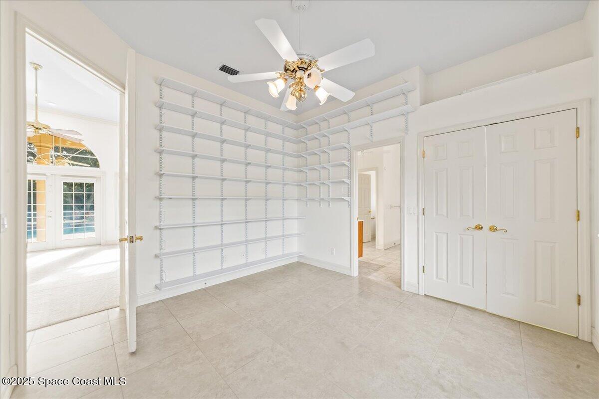 4245 Windover Way Melbourne, FL 32934 - Photo 18 of 50 a view of an empty room with a window