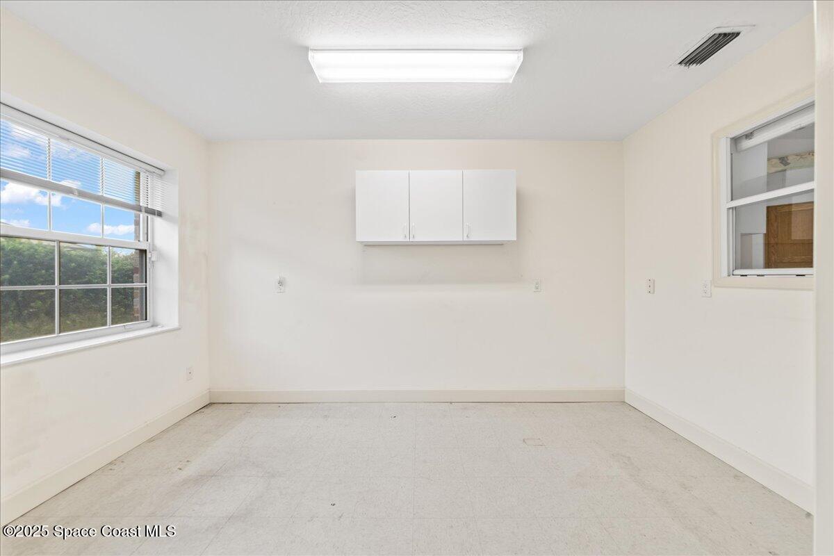 4245 Windover Way Melbourne, FL 32934 - Photo 26 of 50 an empty room with a window