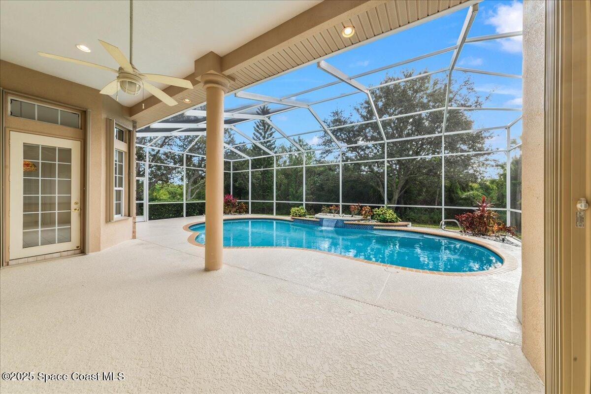 4245 Windover Way Melbourne, FL 32934 - Photo 29 of 50 a view of a living room and balcony
