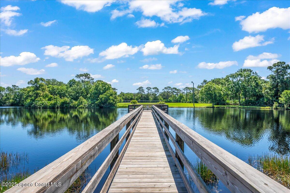 4245 Windover Way Melbourne, FL 32934 - Photo 41 of 50 a lake view with a lake view