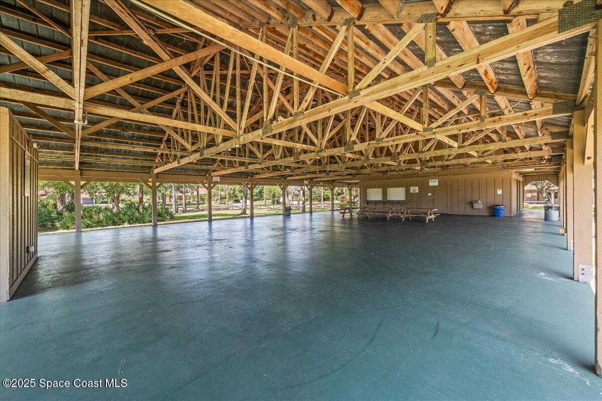 4245 Windover Way Melbourne, FL 32934 - Photo 43 of 50 a view of a room with wooden floor and stairs