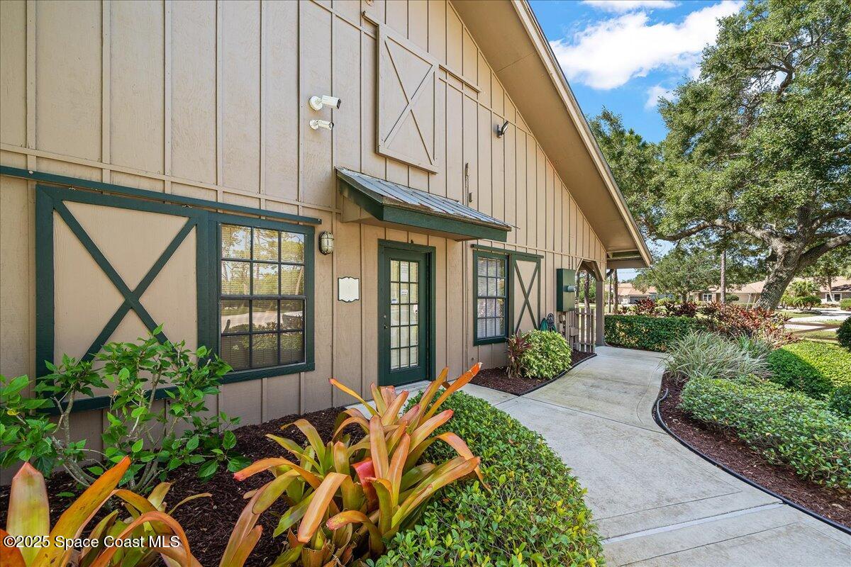 4245 Windover Way Melbourne, FL 32934 - Photo 45 of 50 a view of a house with porch and sitting area