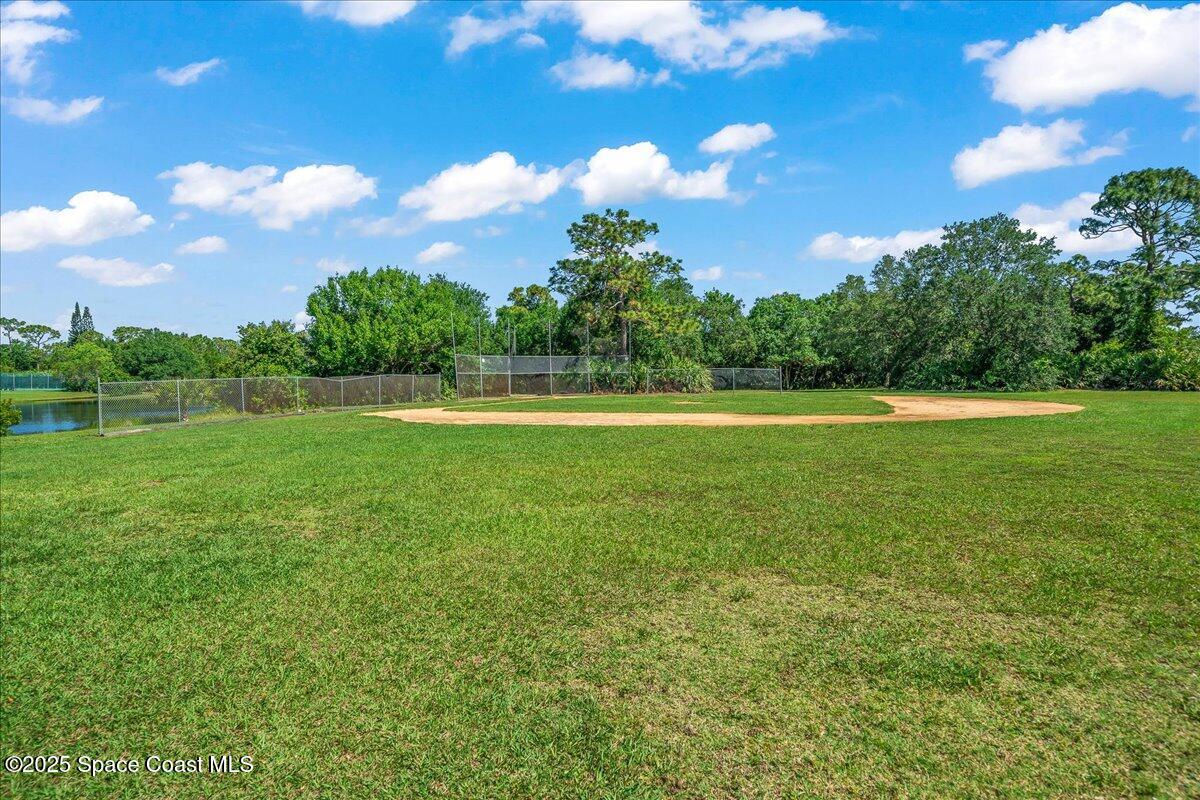 4245 Windover Way Melbourne, FL 32934 - Photo 46 of 50 a view of a green field with clear sky