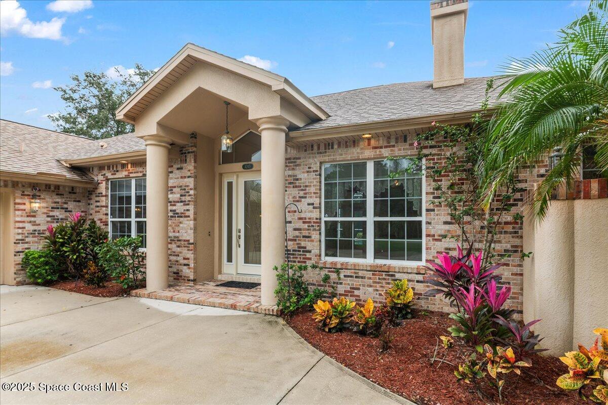 4245 Windover Way Melbourne, FL 32934 - Photo 49 of 50 a front view of a house