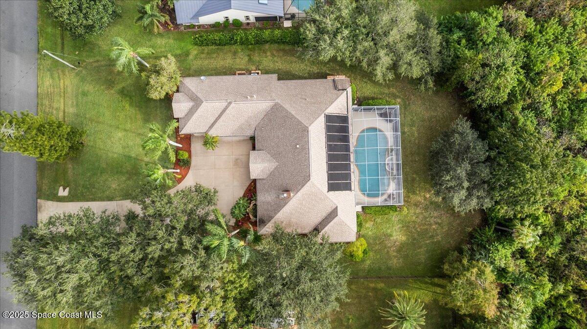 4245 Windover Way Melbourne, FL 32934 - Photo 50 of 50 an aerial view of a house with a yard and plants