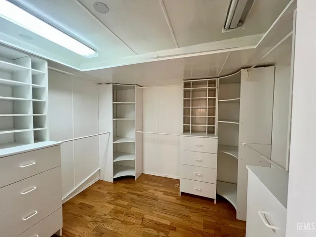 a view of an empty walk in closet