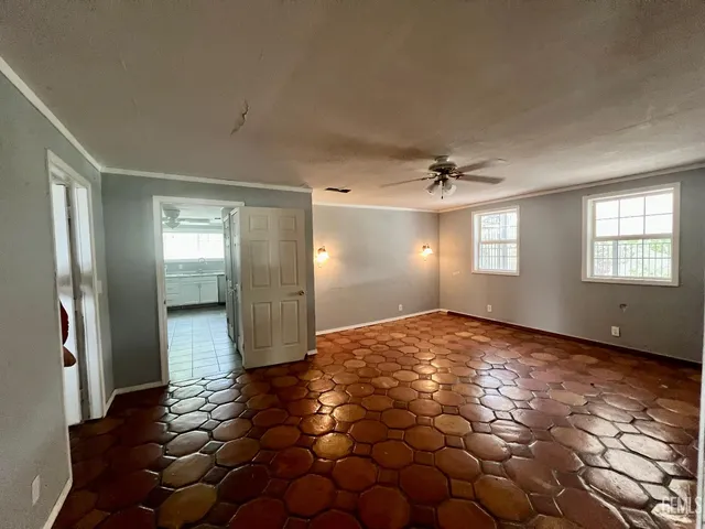 a view of an empty room and window
