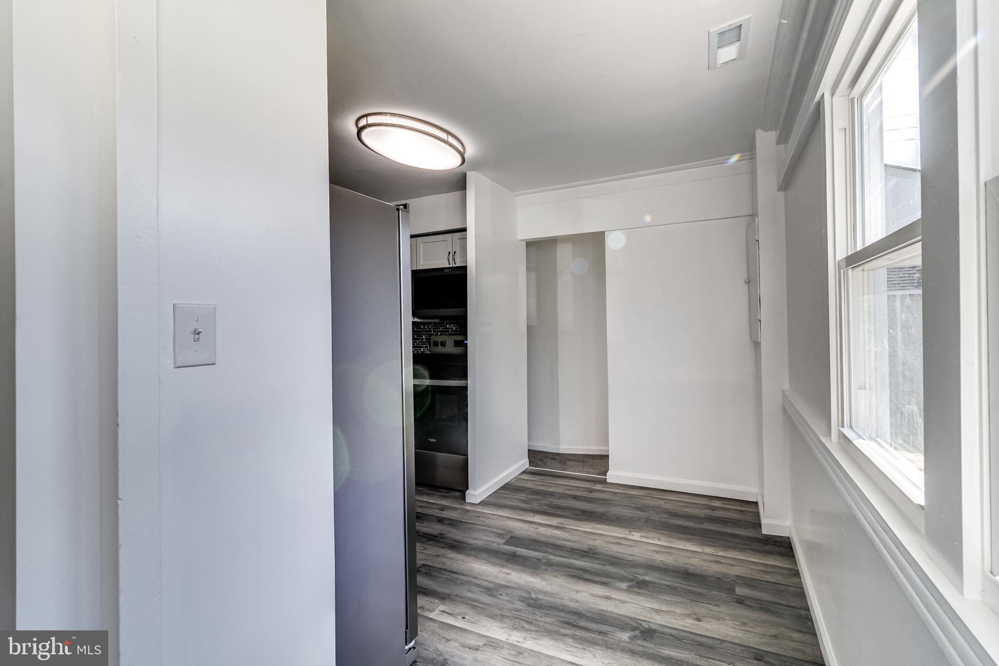 1318 Wilson Point Road Baltimore, MD 21220 - Photo 5 of 26 Kitchen New Flooring