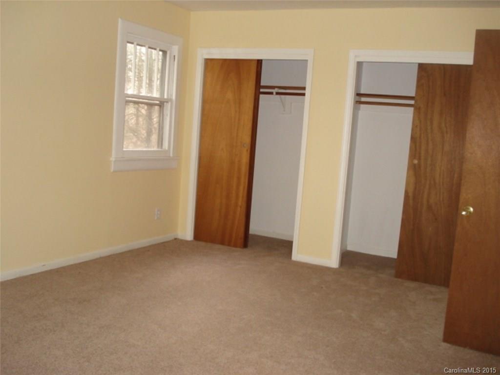 330 Barringer Road Salisbury, NC 28147 - Photo 2 of 10 an empty room with windows and closet area