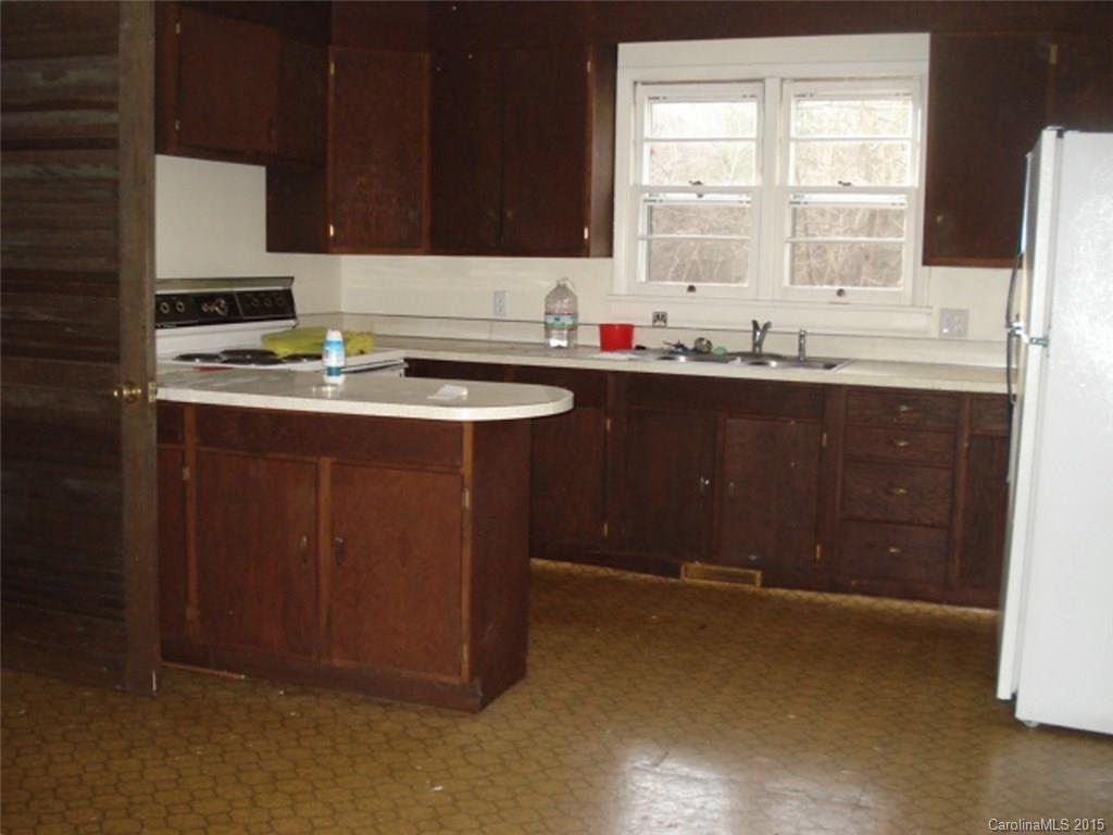 330 Barringer Road Salisbury, NC 28147 - Photo 6 of 10 a kitchen with a sink and a window