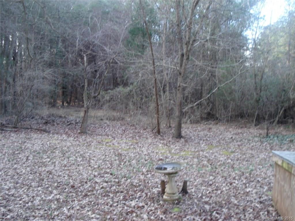 330 Barringer Road Salisbury, NC 28147 - Photo 9 of 10 a backyard of a house with lots of green space