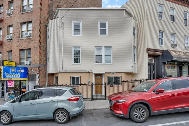 a car parked in front of a house