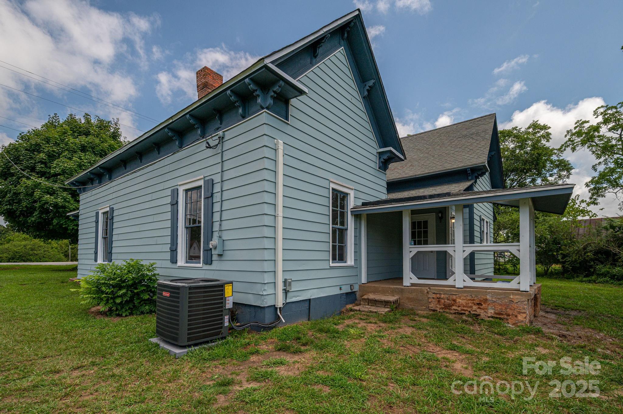 5746 Casar Road Casar, NC 28020 - Photo 22 of 24 a view of a house with backyard and sitting area