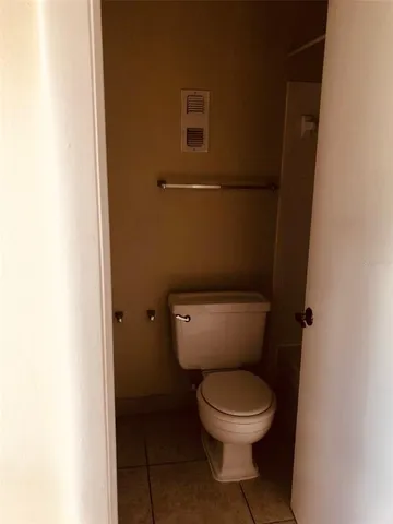 a bathroom with a toilet