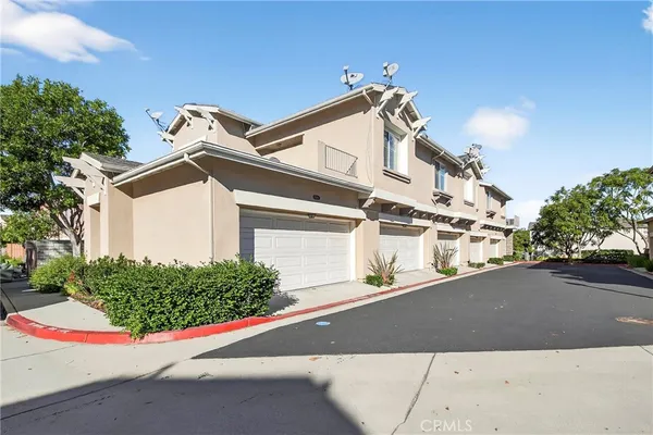 a front view of a house with a garage
