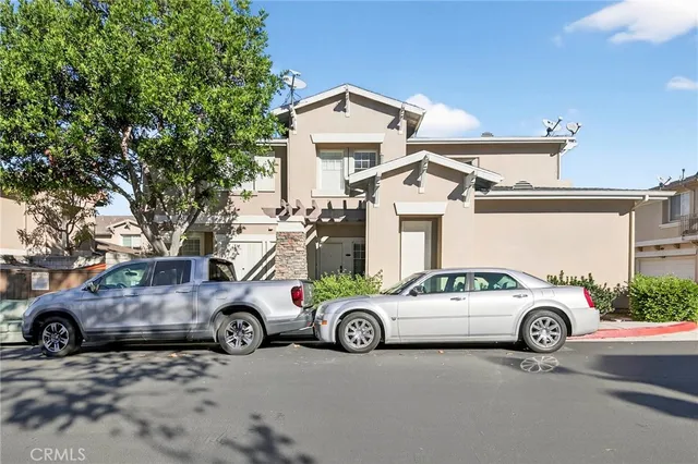 a cars parked in front of a house
