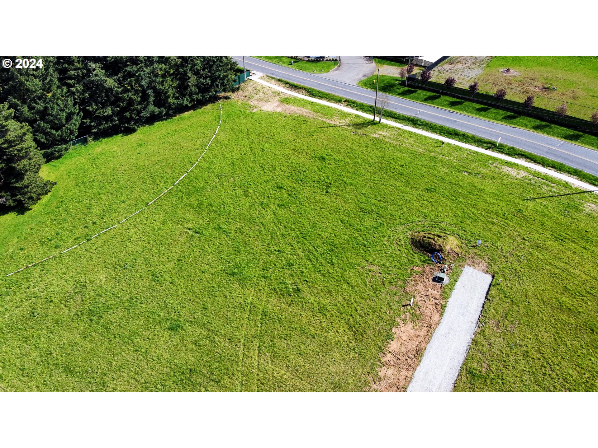 15622 Northeast Caples Road, Unit 3 Brush Prairie, WA 98606 - Photo 4 of 14 a open area with grassy field