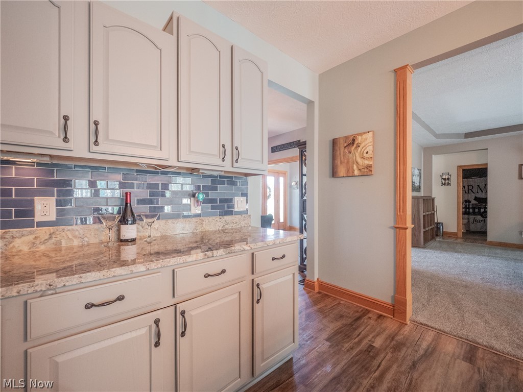41342 Ravines Edge Way Lagrange, OH 44050 - Photo 5 of 35 Loveley cabinets with blue backsplash