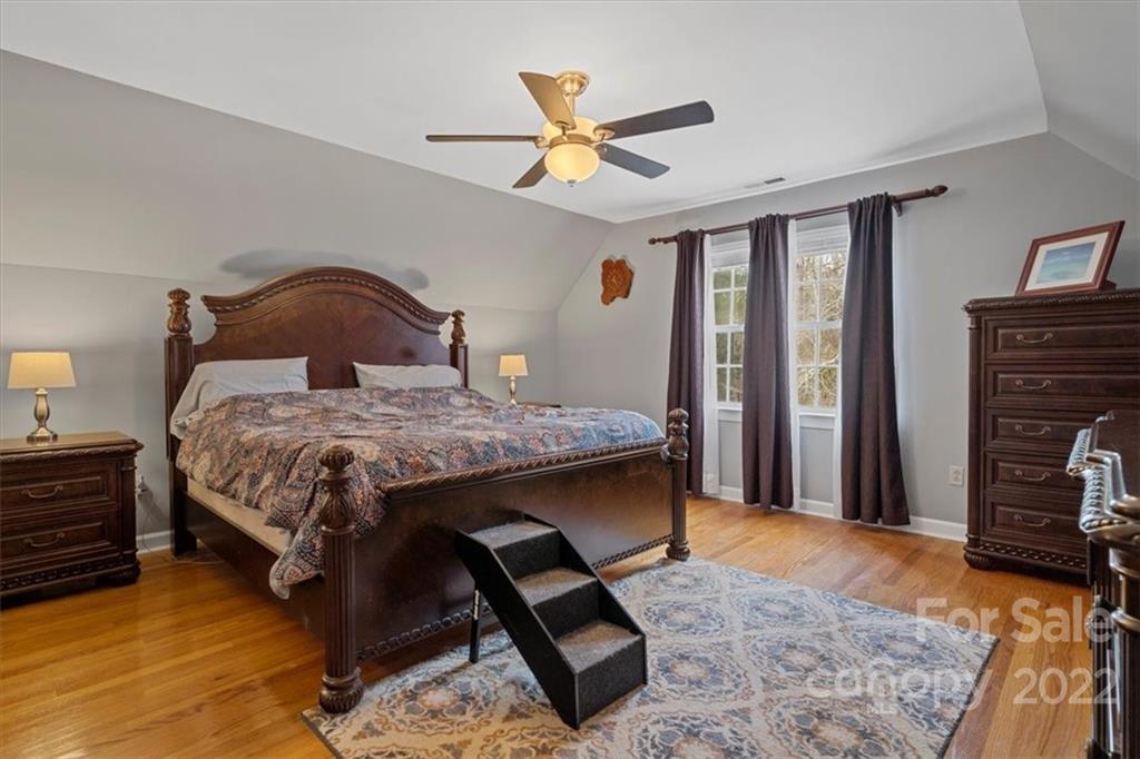 1574 Dirt Road Lancaster, SC 29720 - Photo 14 of 36 a bedroom with a bed window and a ceiling fan