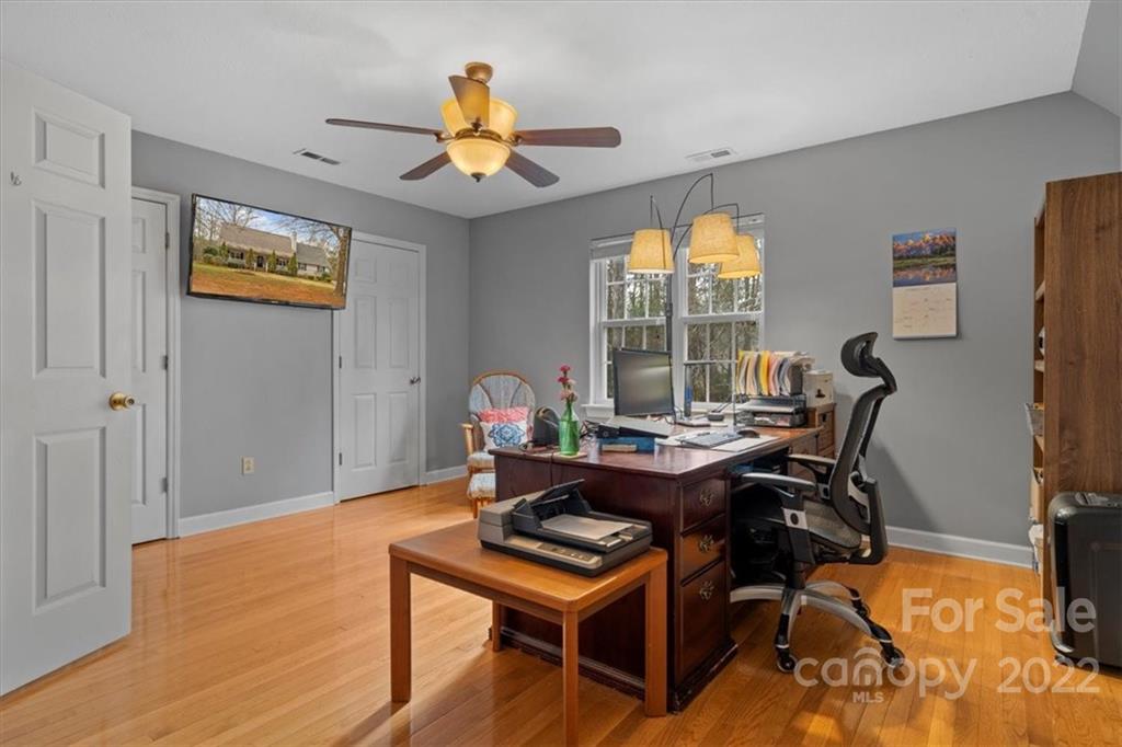 1574 Dirt Road Lancaster, SC 29720 - Photo 17 of 36 a view of a workspace with furniture and a window