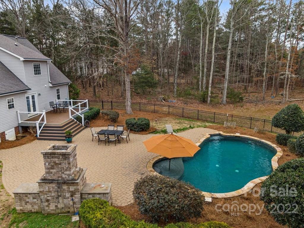 1574 Dirt Road Lancaster, SC 29720 - Photo 25 of 36 a view of backyard with swimming pool and outdoor seating