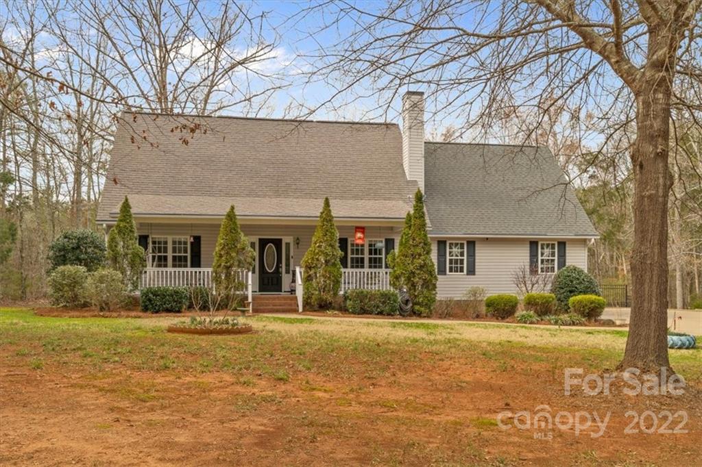 1574 Dirt Road Lancaster, SC 29720 - Photo 35 of 36 a front view of a house with a yard
