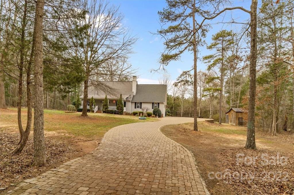 1574 Dirt Road Lancaster, SC 29720 - Photo 36 of 36 a view of a yard with plants and trees