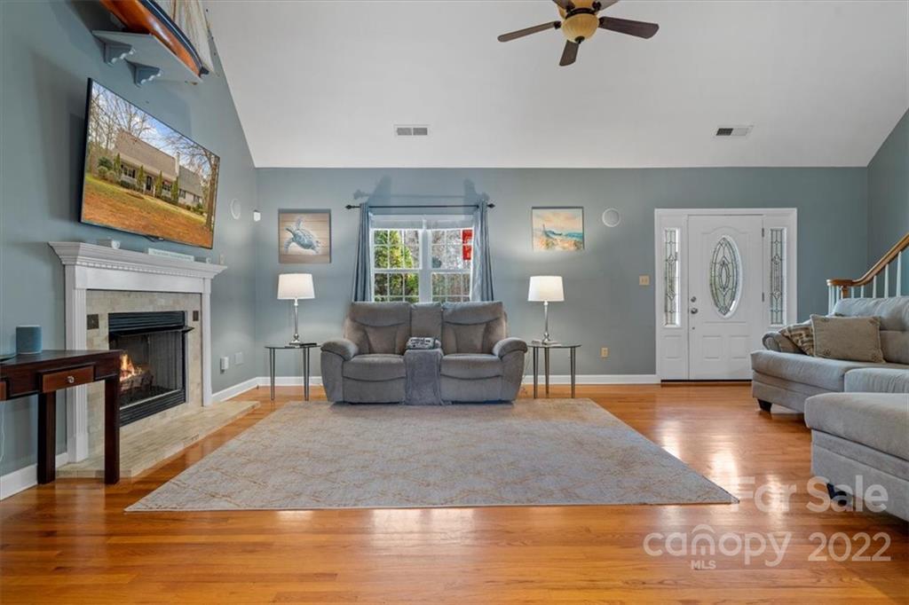 1574 Dirt Road Lancaster, SC 29720 - Photo 7 of 36 a living room with furniture and a fireplace